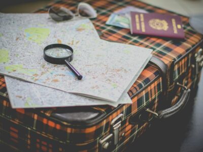 Photo by Francesca Tirico black magnifying glass on map